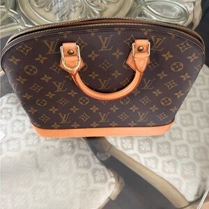 Louis Vuitton Alma MM Monogram Canvas Handbag with Natural Trim